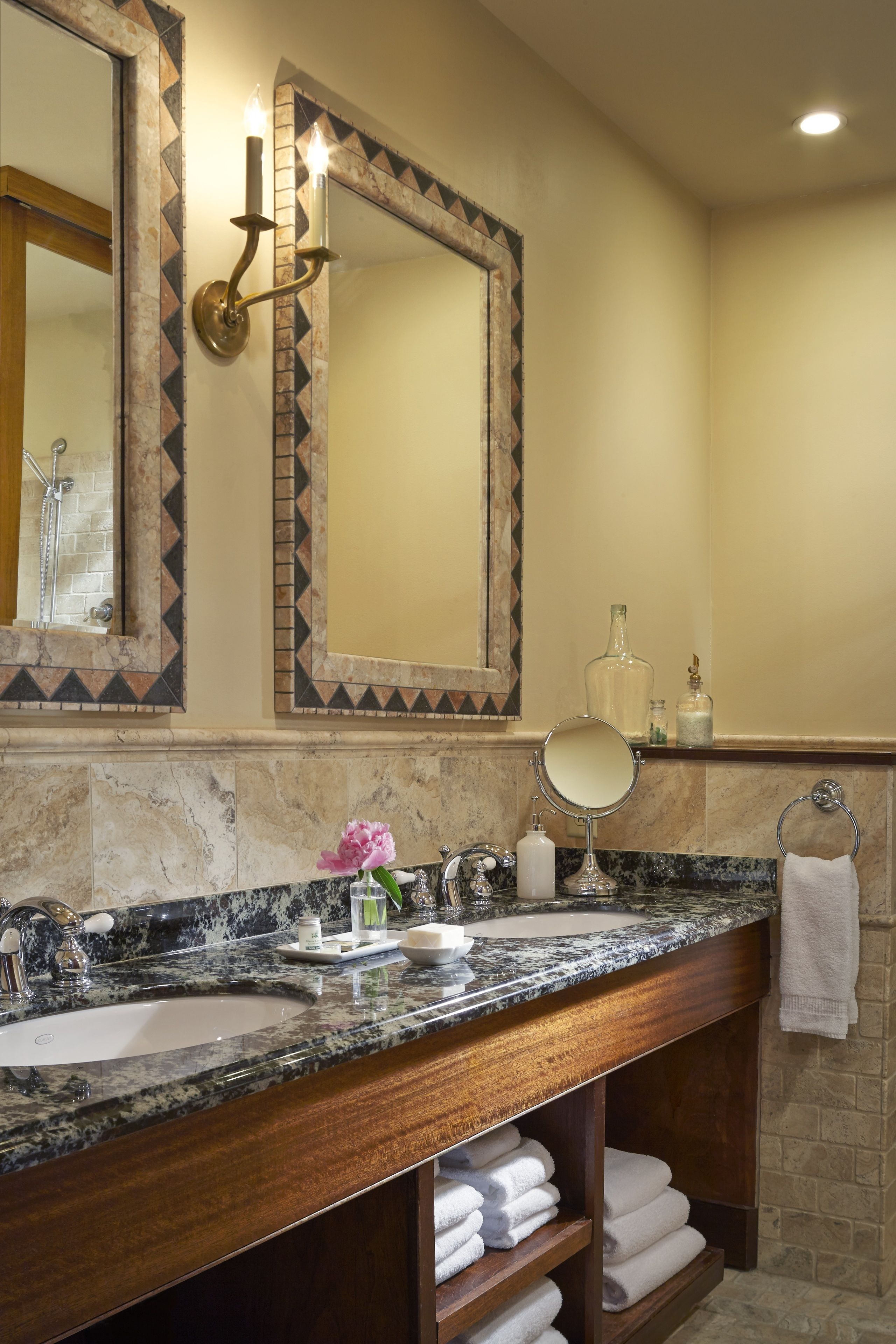 mirror lake suite, waterfront with balcony, whirlpool tub and fireplace | bathroom sink