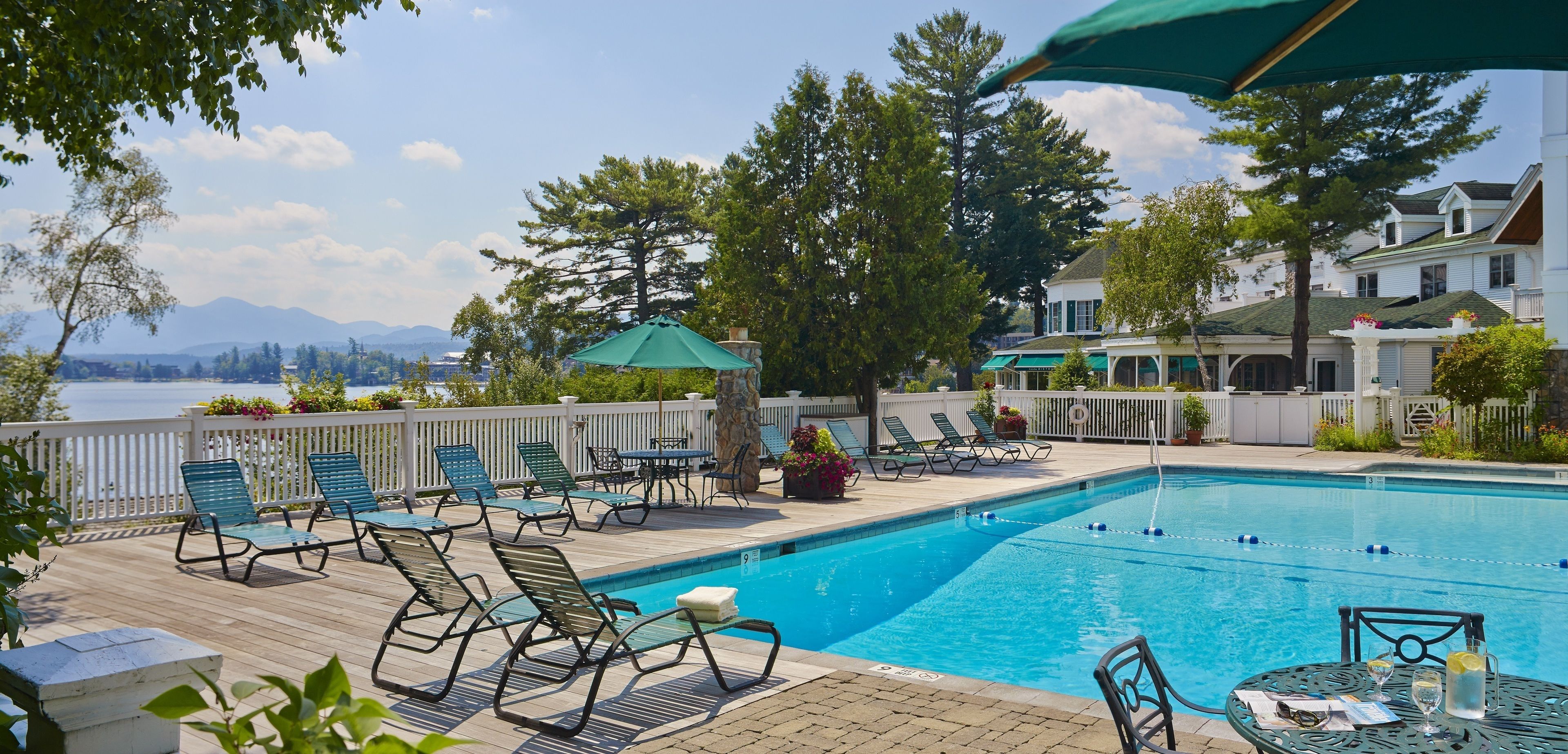 indoor pool, seasonal outdoor pool, pool umbrellas, pool loungers