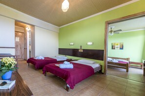 Quadruple Room, Beach View | Iron/ironing board, free cribs/infant beds, bed sheets