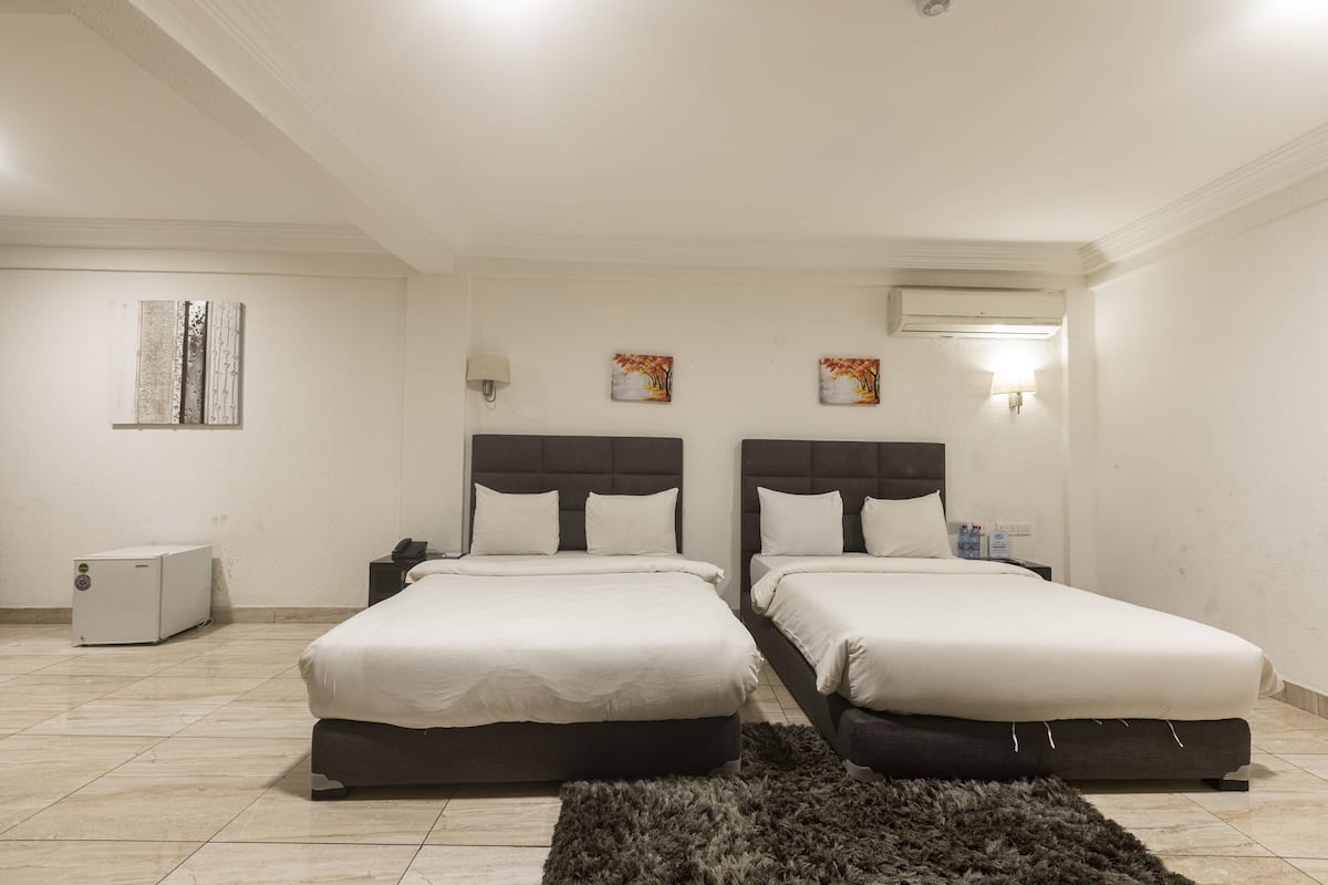 Standaard Twin kamer | Luxe beddengoed, een minibar, een kluis op de kamer, een bureau