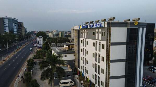 A multi-story building with a sign reading "Airport View Hotel". - Airport View Hotel (Accra)