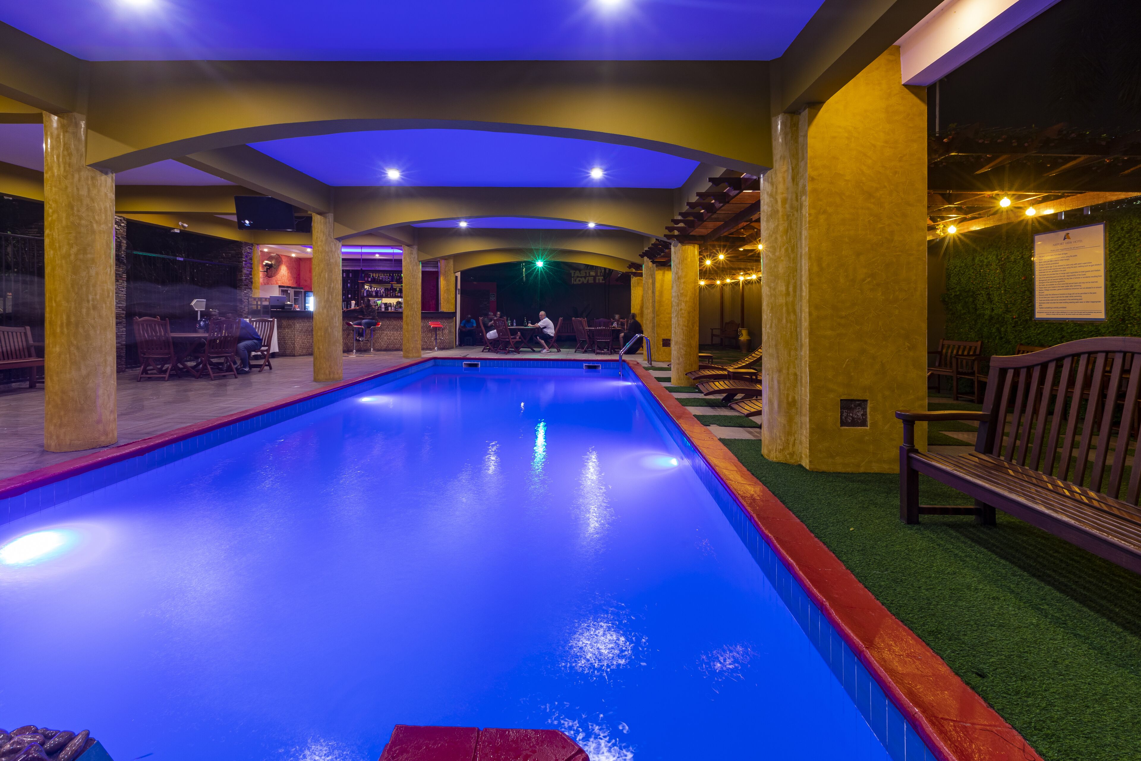 indoor pool, outdoor pool, pool umbrellas, pool loungers