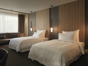 Ropa de cama de alta calidad y minibar
