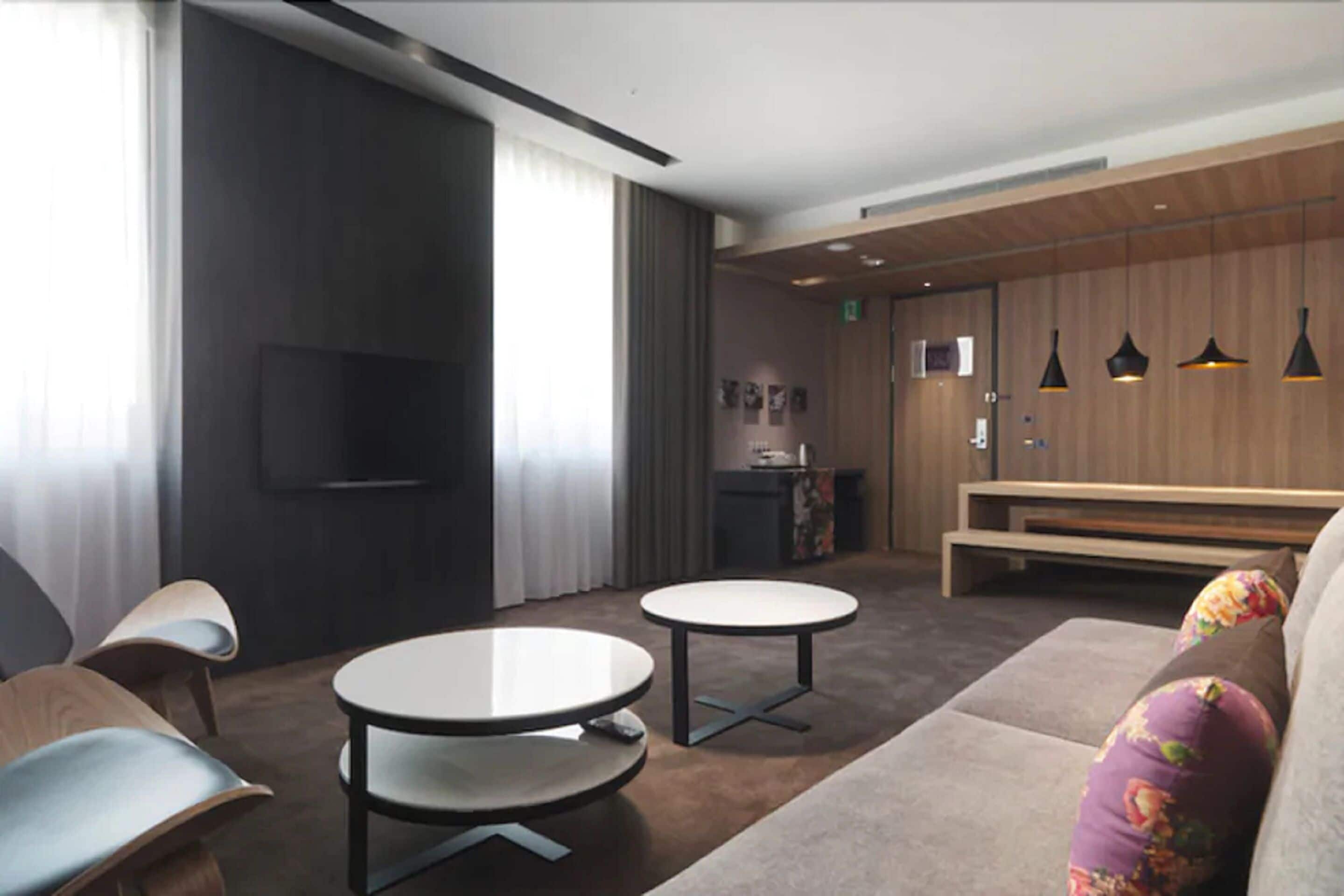 family room | premium bedding, minibar, in-room safe, desk