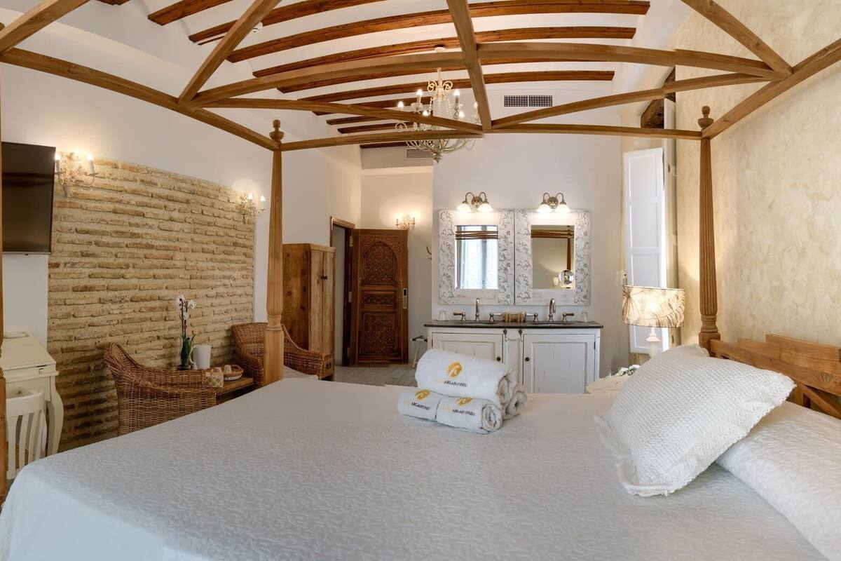 deluxe double room | down duvets, memory-foam beds, minibar, in-room safe