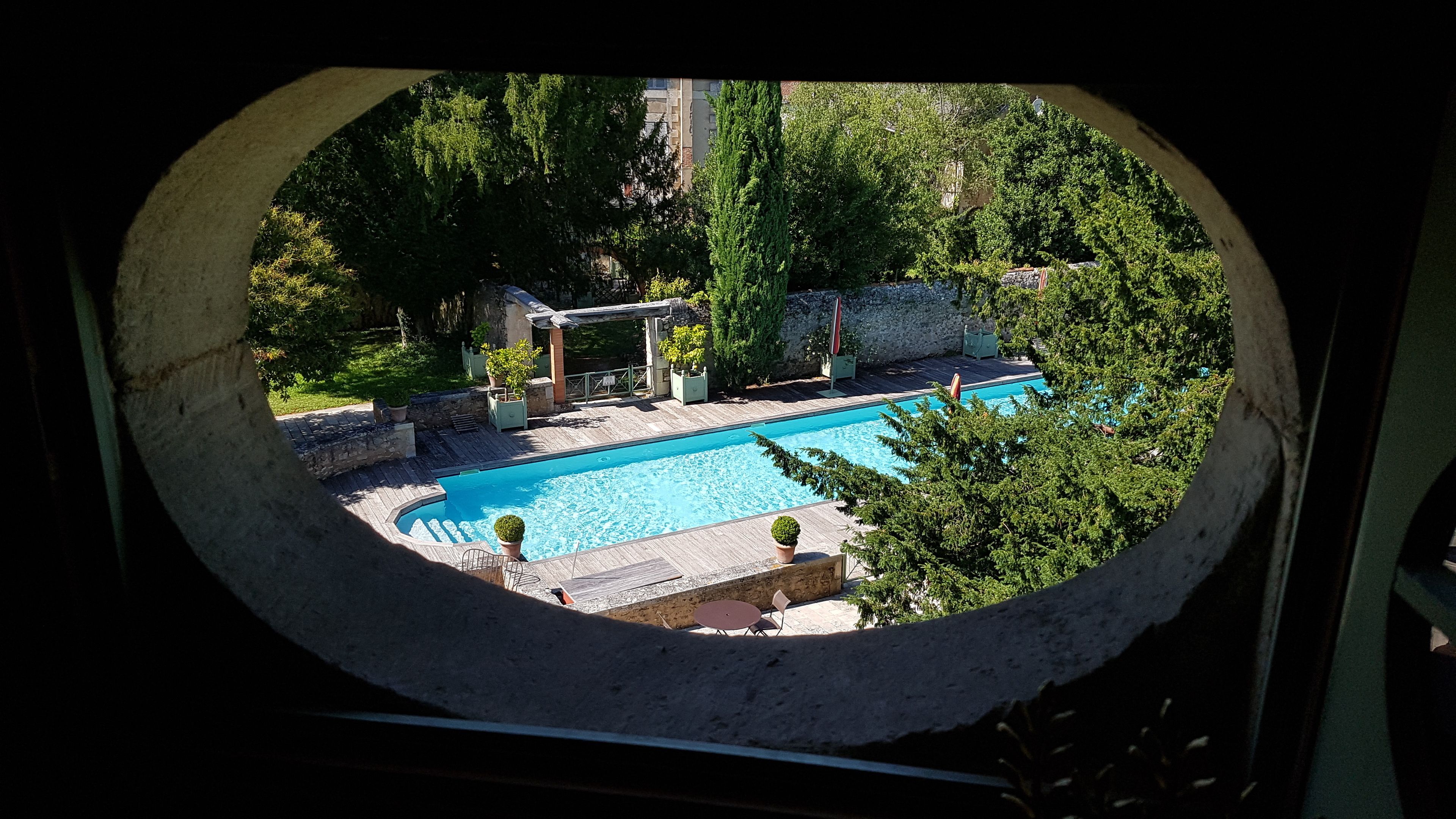 outdoor pool, pool umbrellas, pool loungers