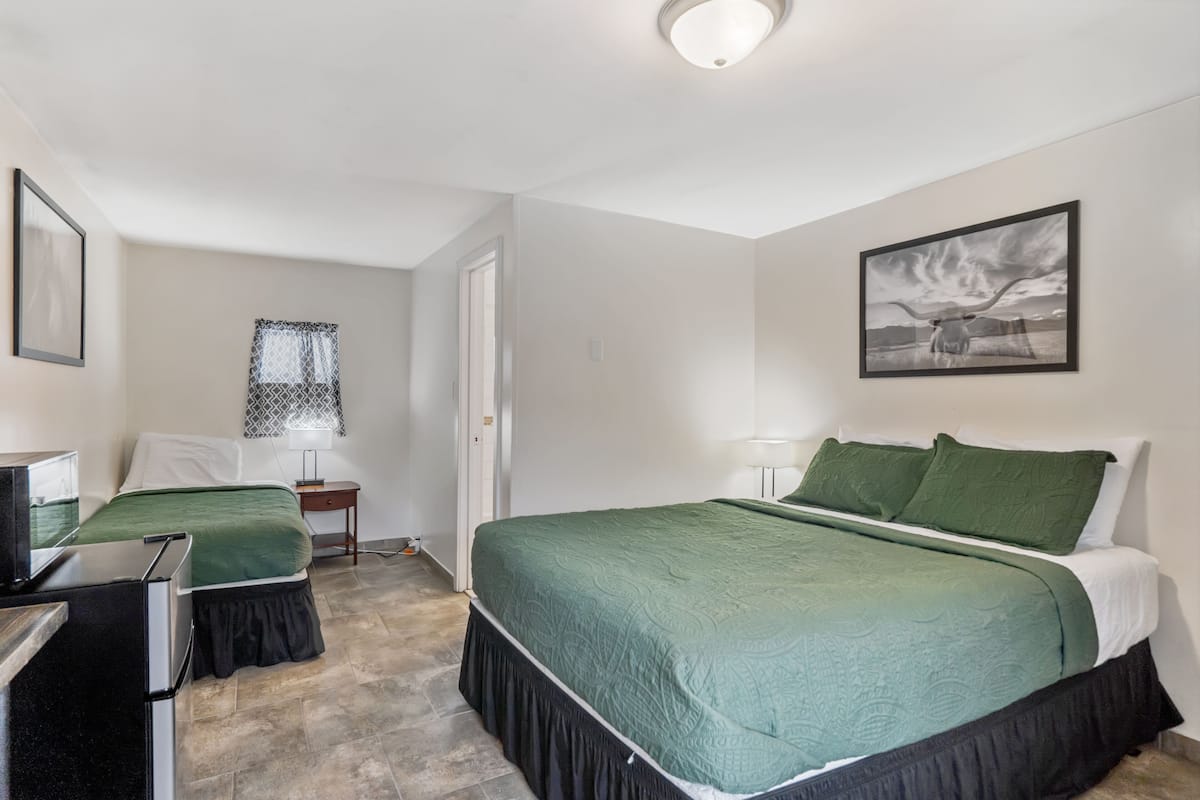 Standard Triple Room | Individually decorated, individually furnished, blackout drapes