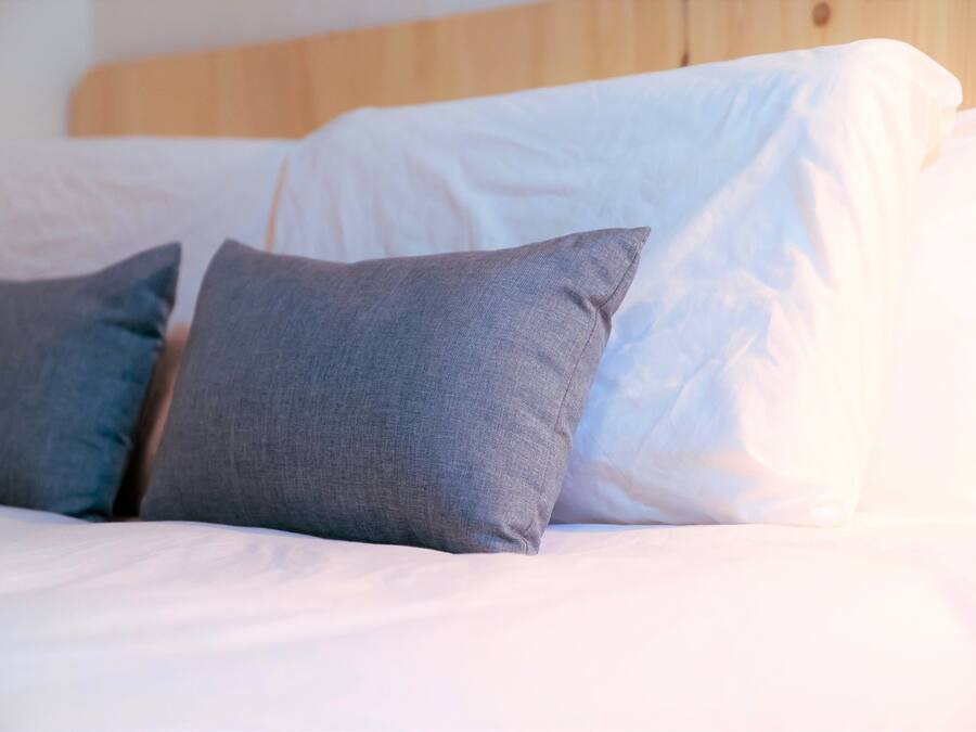 Premium bedding, in-room safe, laptop workspace, soundproofing