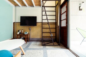 Design Loft, 1 Double Bed, Patio, Mezzanine | Living room