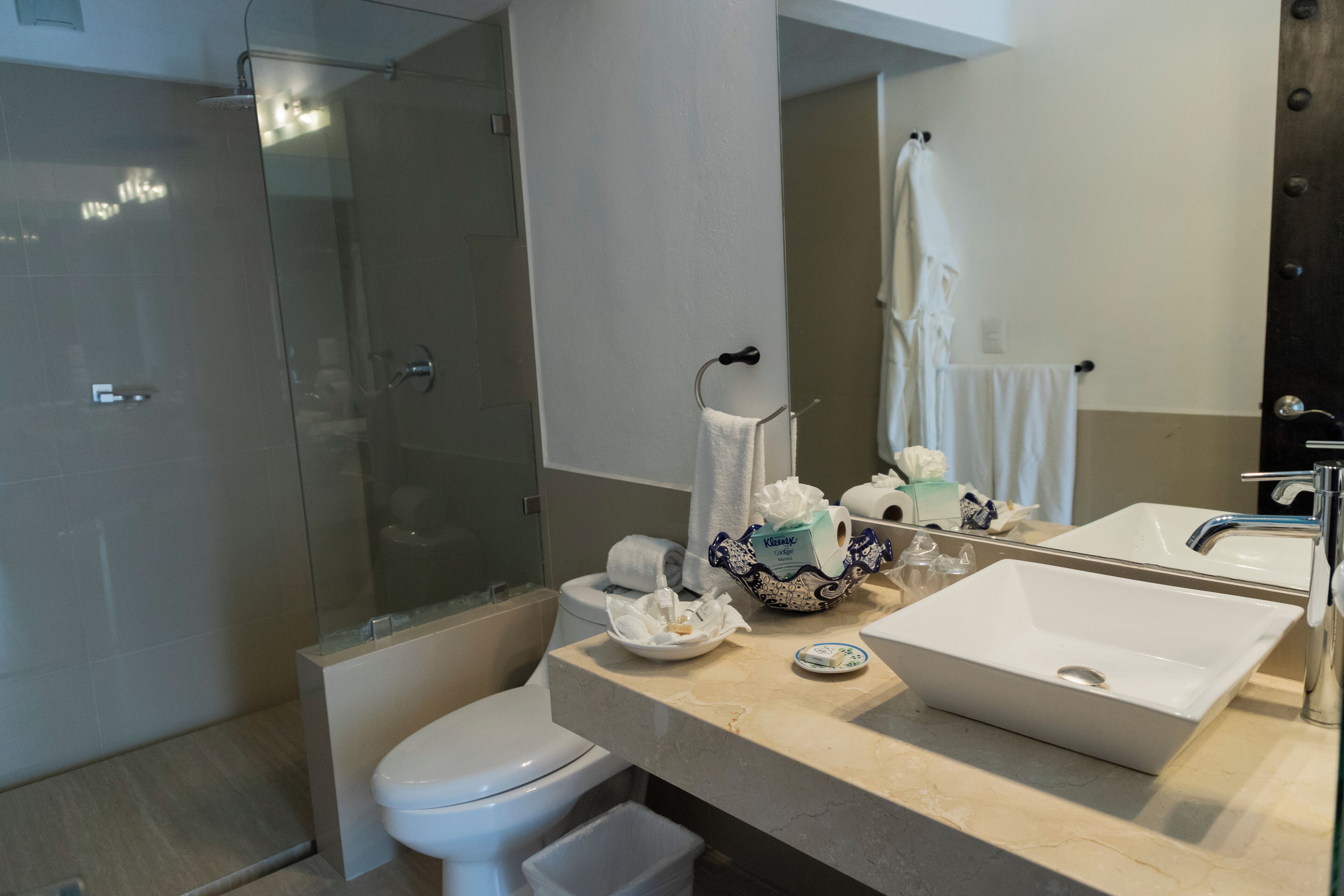 coronel suite, king bed, garden area | bathroom | shower, free toiletries, hair dryer, bathrobes