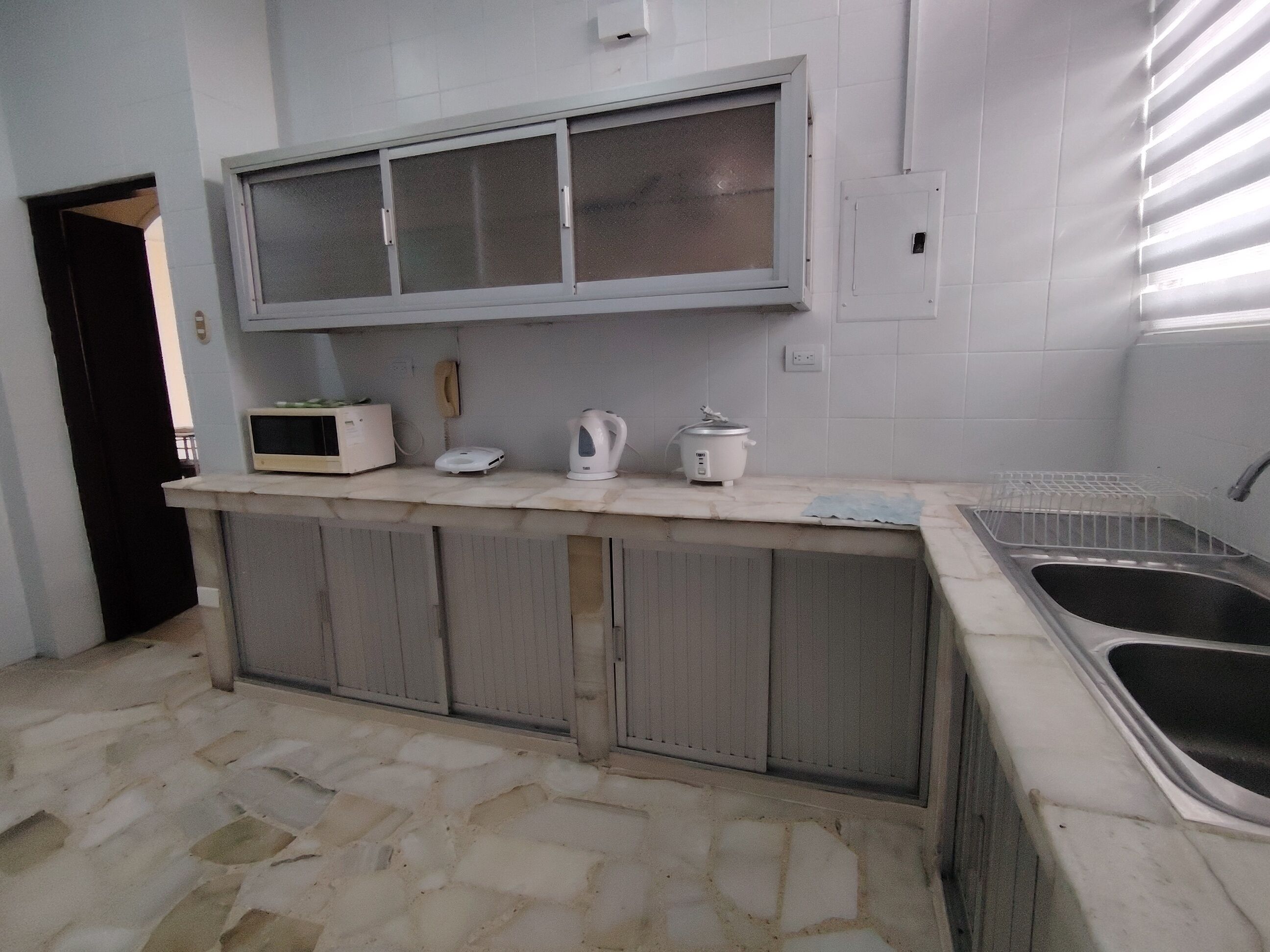 Full-sized fridge, coffee/tea maker, cookware/dishes/utensils