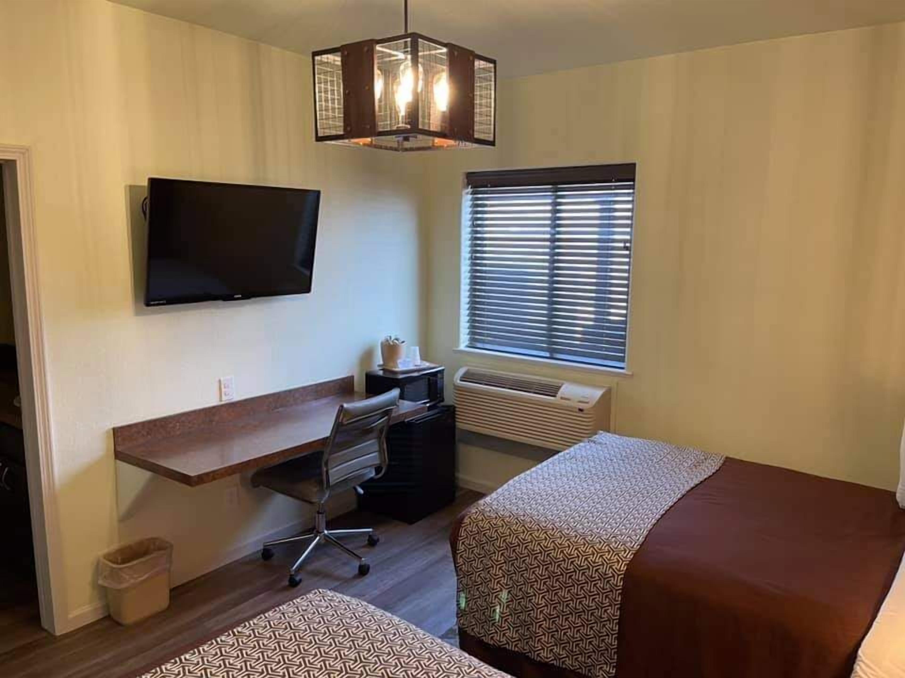 standard double room | premium bedding, pillow-top beds, blackout curtains, iron/ironing board