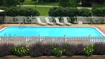 Seasonal outdoor pool, pool umbrellas, pool loungers