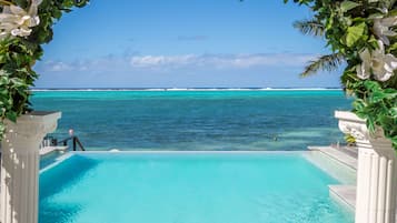 Outdoor pool, pool umbrellas, sun loungers