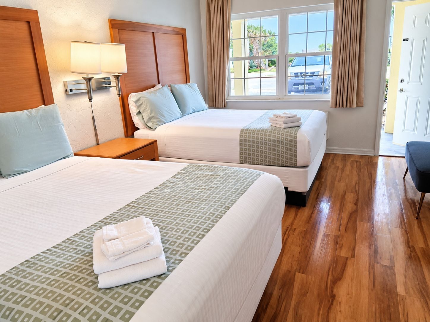 Premium bedding, laptop workspace, blackout drapes, iron/ironing board