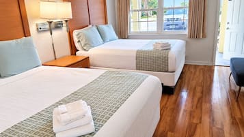Premium bedding, laptop workspace, blackout drapes, iron/ironing board