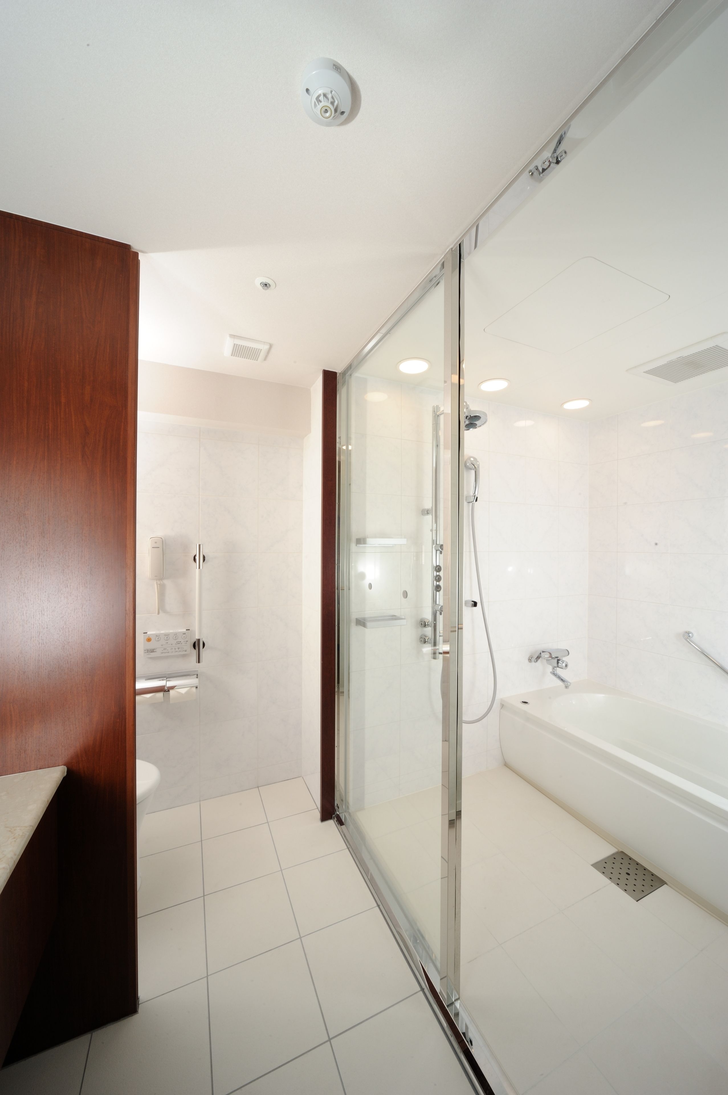 hair dryer, slippers, electronic bidet, towels