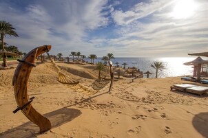 Private beach, free beach cabanas, sun loungers, beach towels