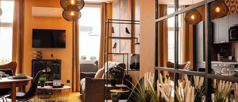 Superior Apartment | Living area | Flat-screen TV