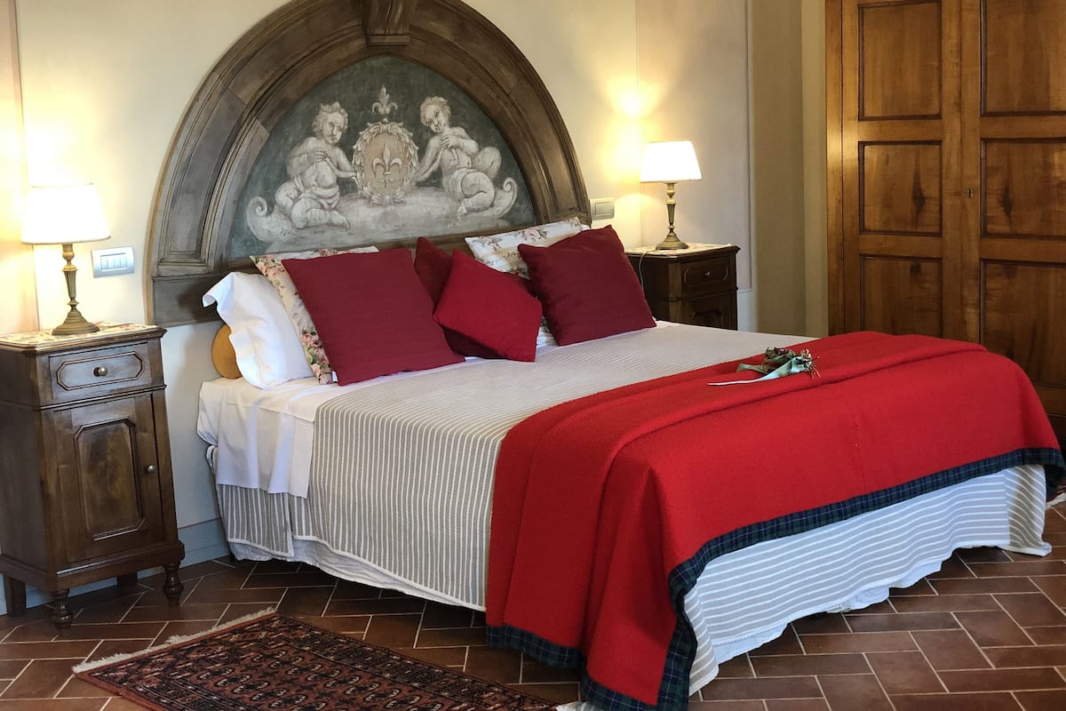 Suite Deluxe | Draps italiens Frette, literie de qualité supérieure