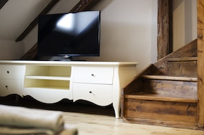 Quadruple Room, 2 Bedrooms, City View | Living area | Flat-screen TV