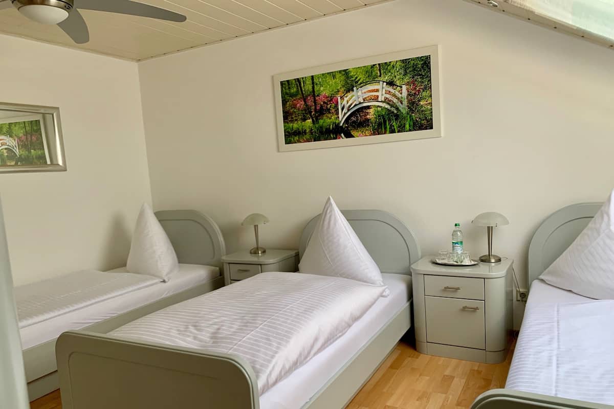 Triple Room | Premium bedding, desk, iron/ironing board, free WiFi