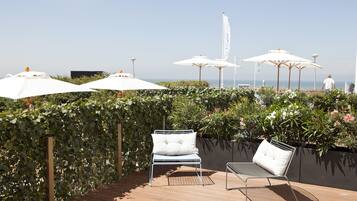 Suite junior, 1 cama King size, Terraza, vista al océano | Terraza o patio