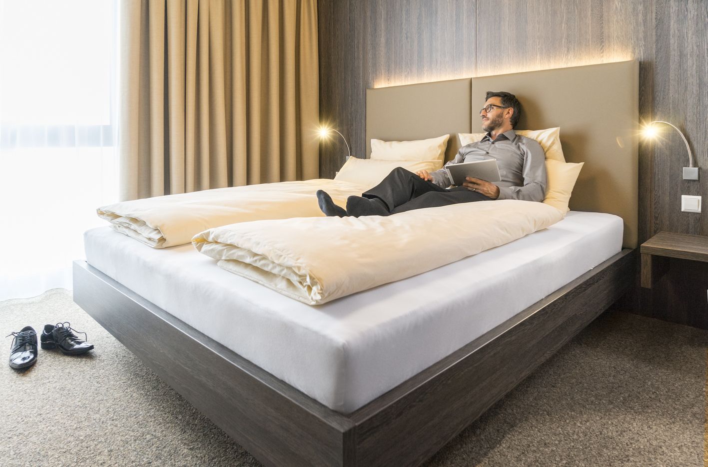 premium bedding, desk, laptop workspace, blackout curtains