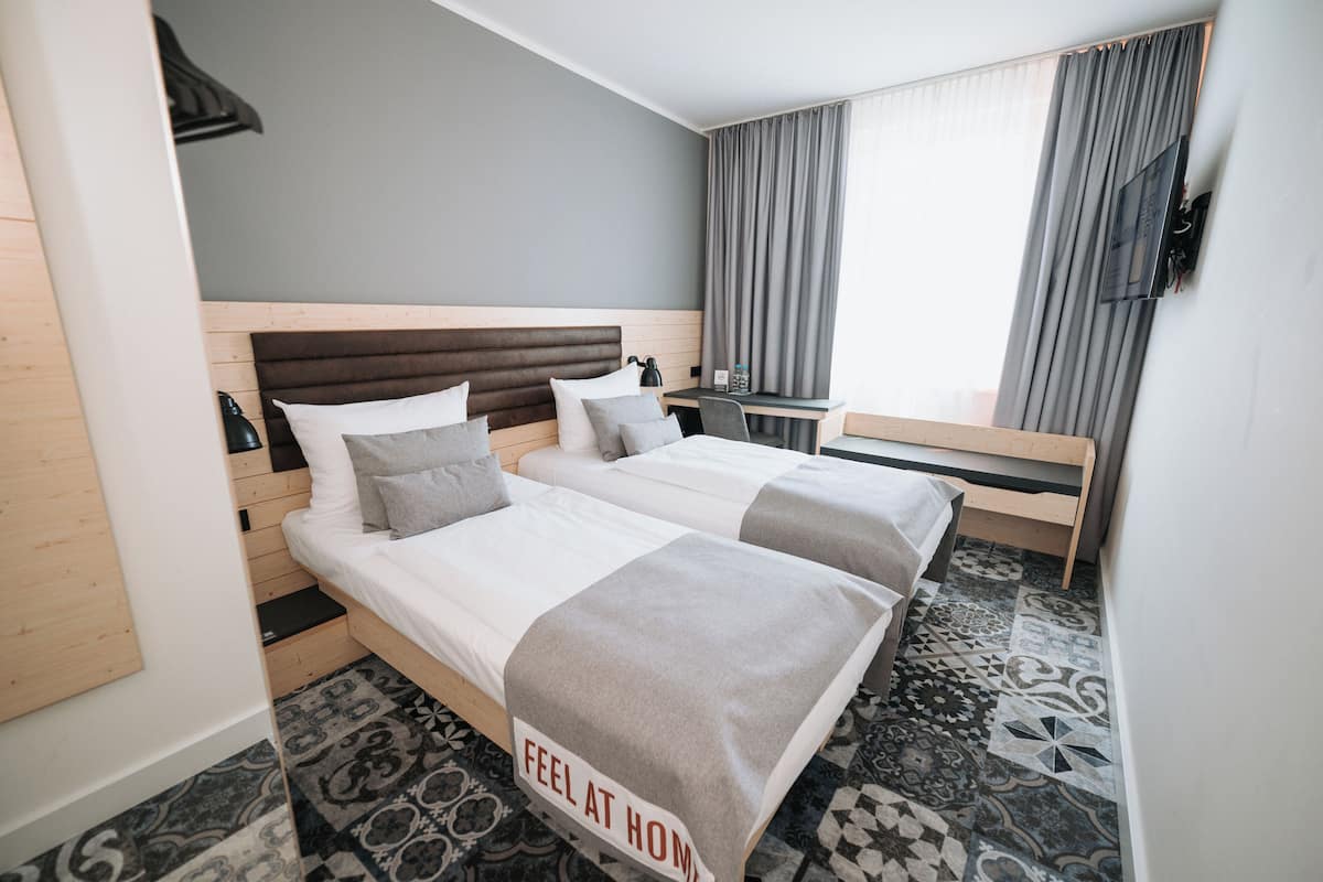 3 bedrooms, premium bedding, in-room safe, desk