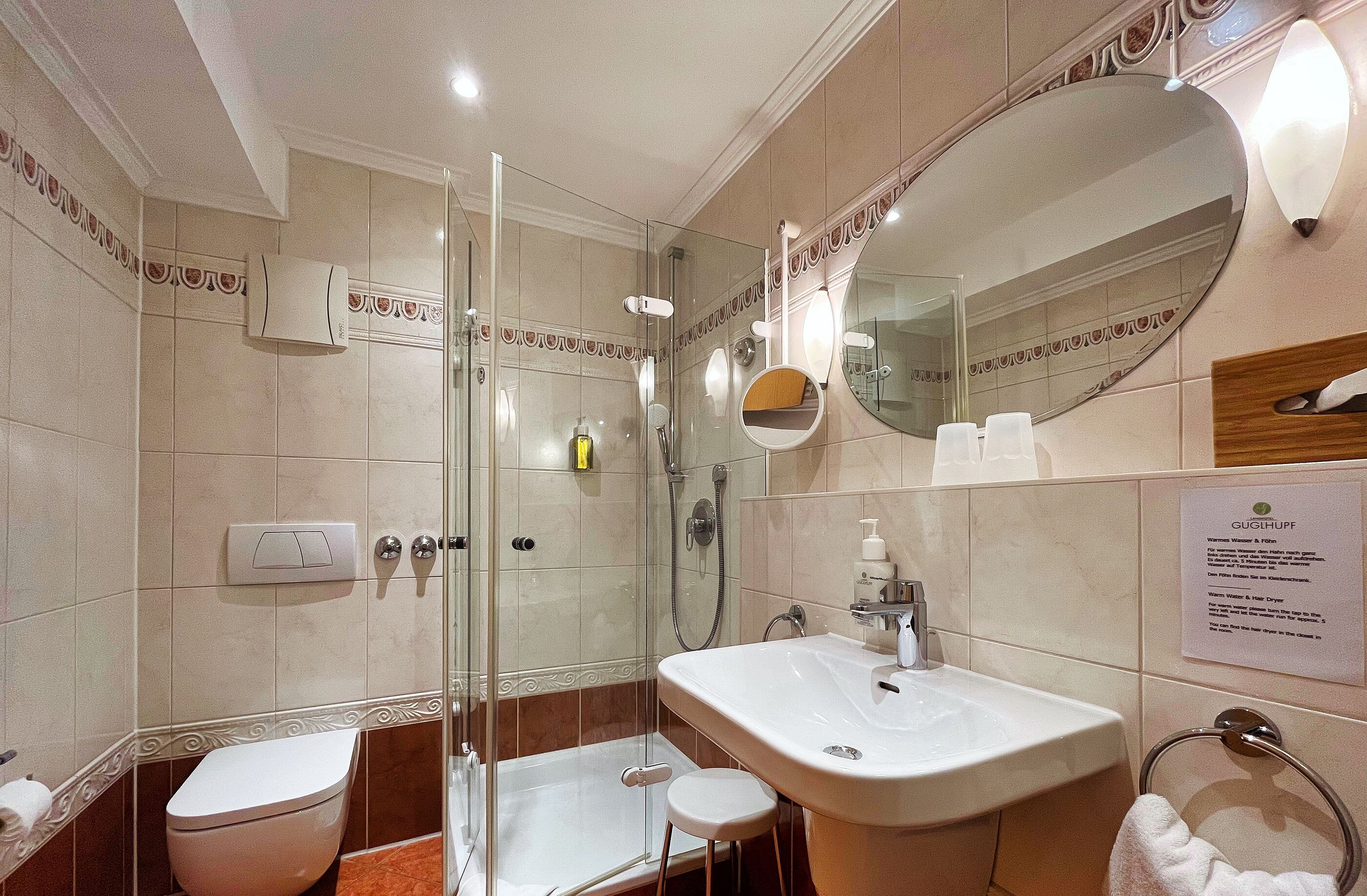 comfort double room, 1 king bed with sofa bed, non smoking | bathroom | free toiletries, hair dryer, towels