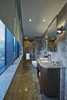 Deep soaking tub, rainfall showerhead, free toiletries, hair dryer