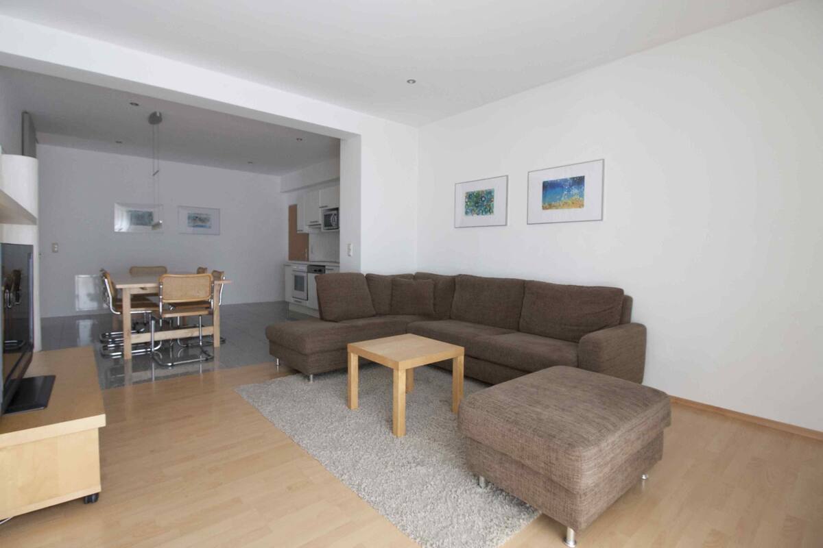 Premium Apartment, 2 Bedrooms, Balcony (Excl. One-time service fee of 120 EUR) | Living room | 40-inch flat-screen TV with satellite channels, TV