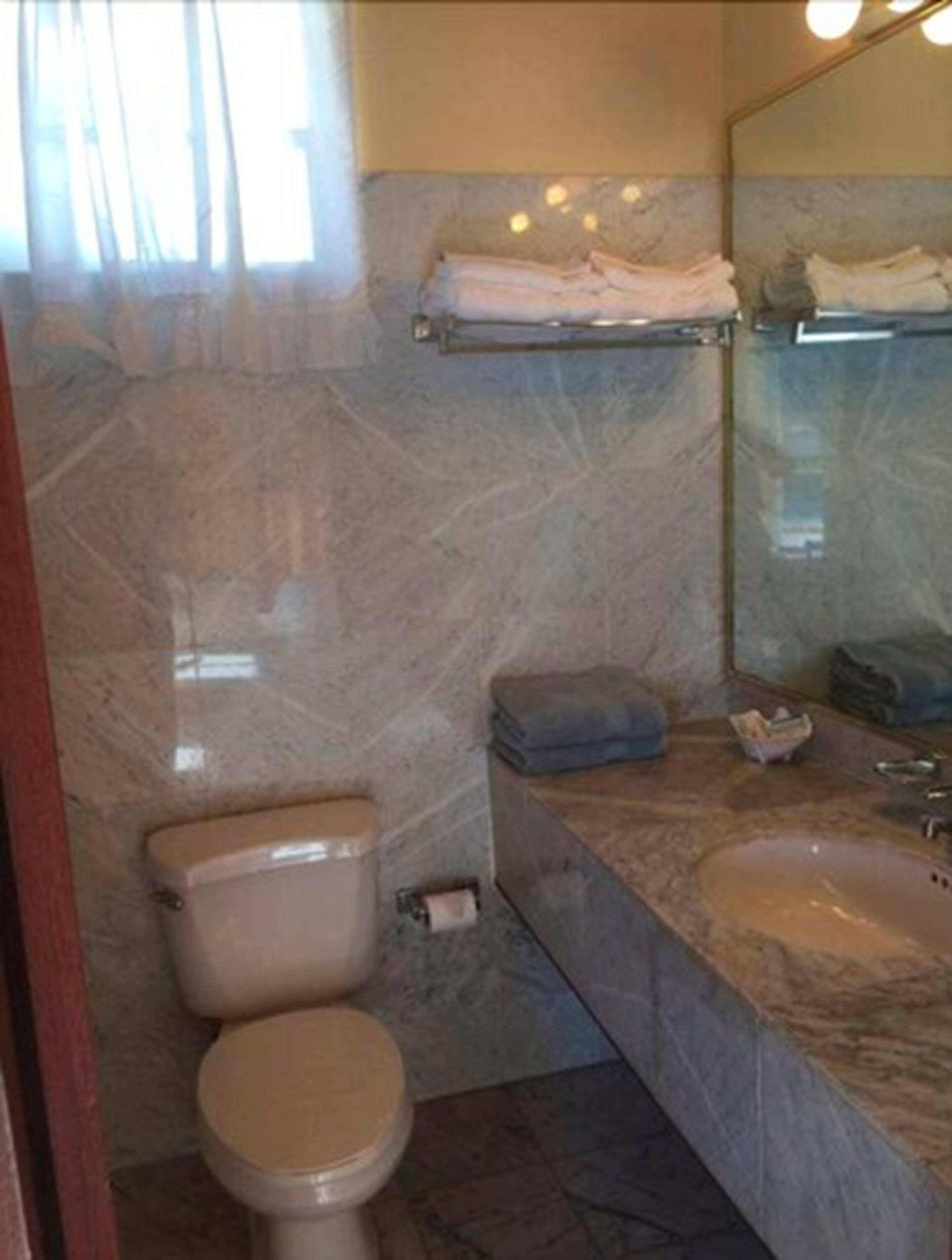 bathtub, free toiletries, hair dryer, towels
