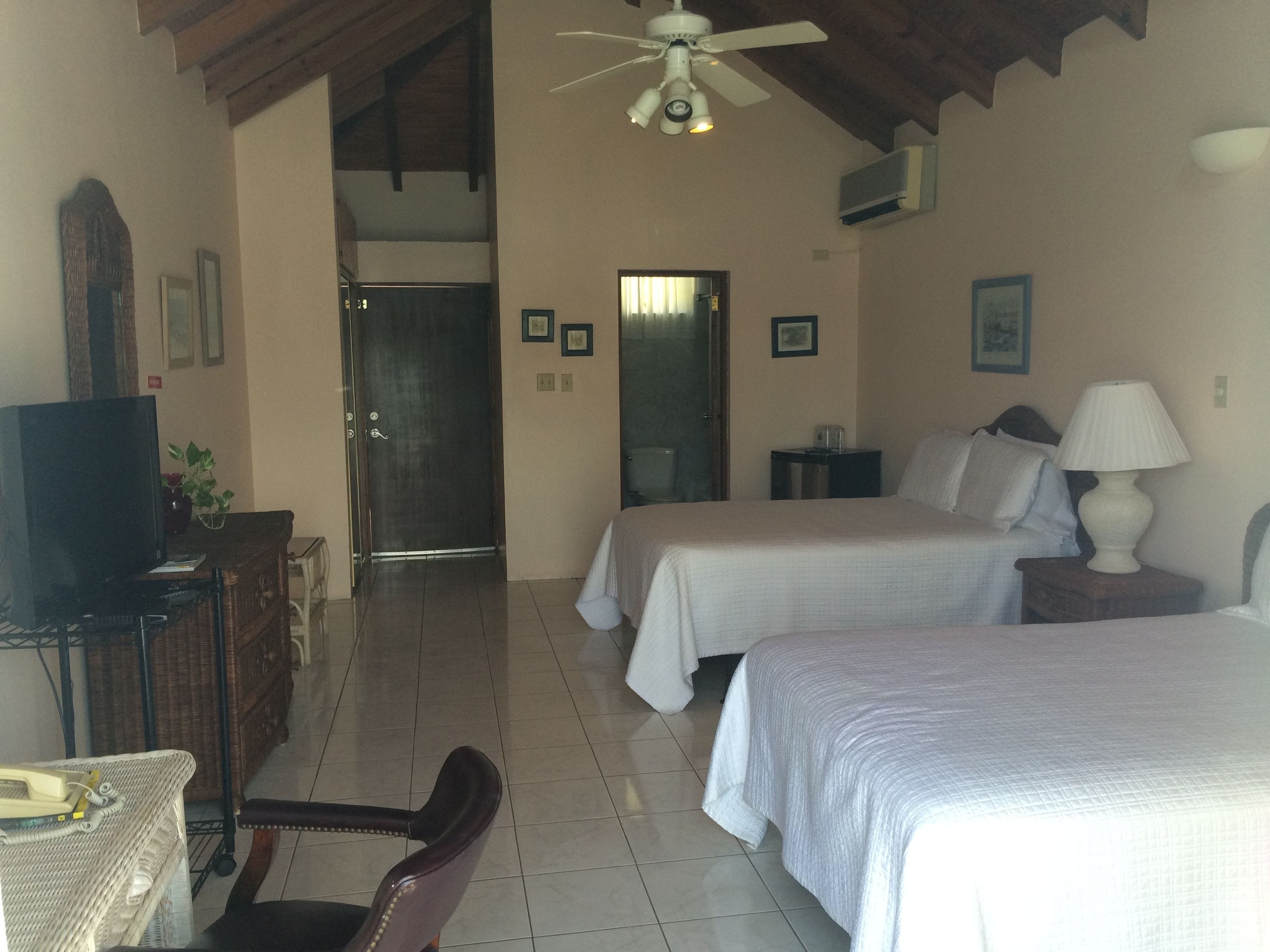 deluxe room, 2 double beds, balcony | premium bedding, in-room safe, desk, iron/ironing board