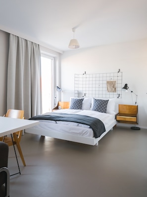 Suite | Hochwertige Bettwaren, Zimmersafe, individuell eingerichtet