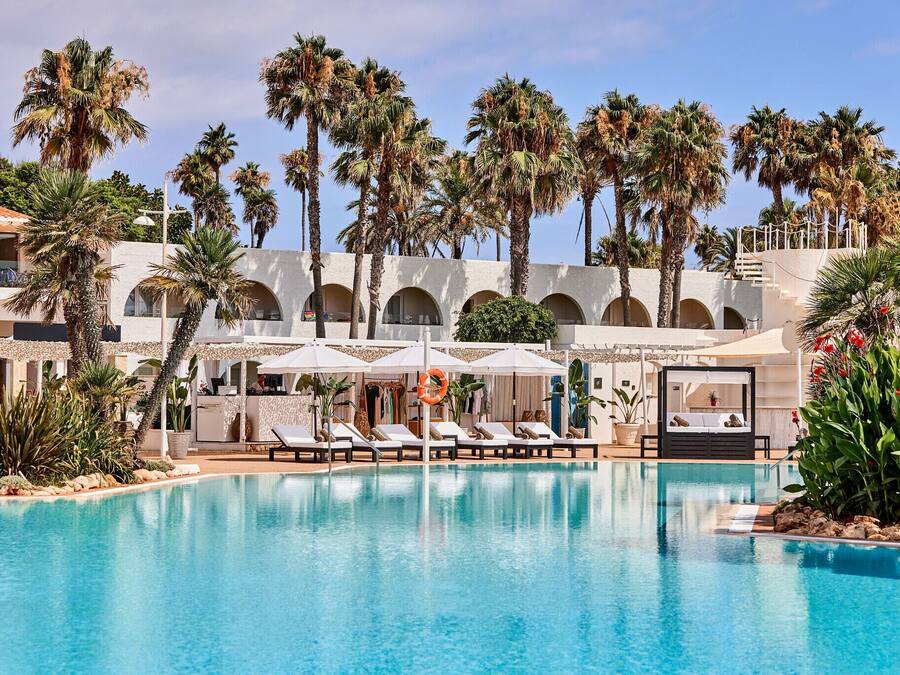 2 outdoor pools, open 10:00 AM to 6:00 PM, pool umbrellas, pool loungers