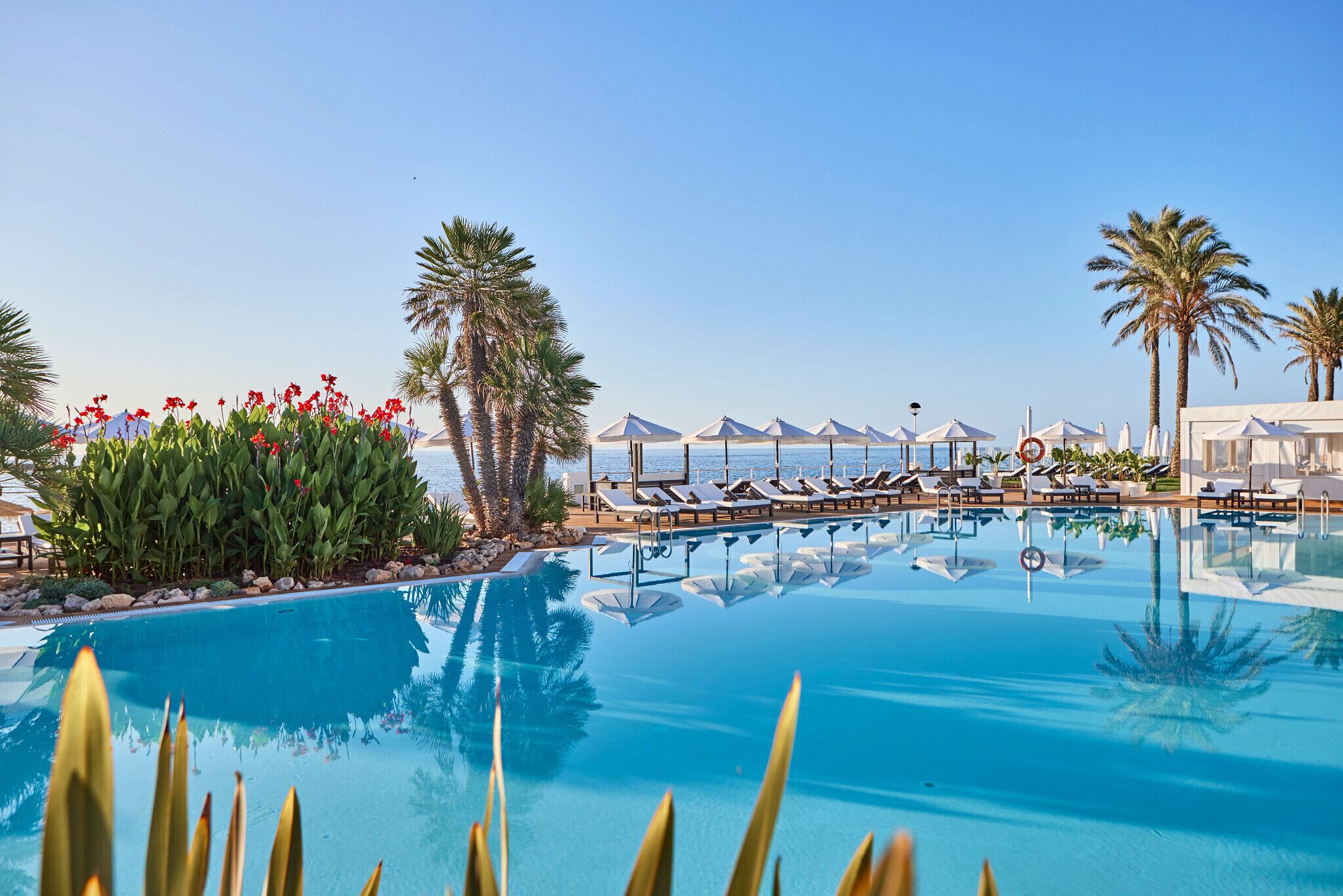 2 outdoor pools, open 10:00 AM to 6:00 PM, pool umbrellas, sun loungers