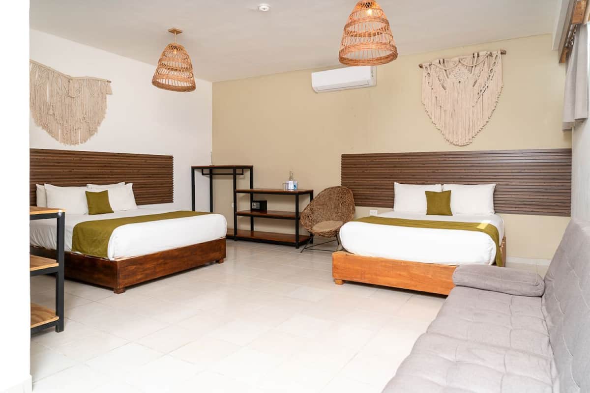 Deluxe Quadruple Room | Hypo-allergenic bedding available, minibar, in-room safe