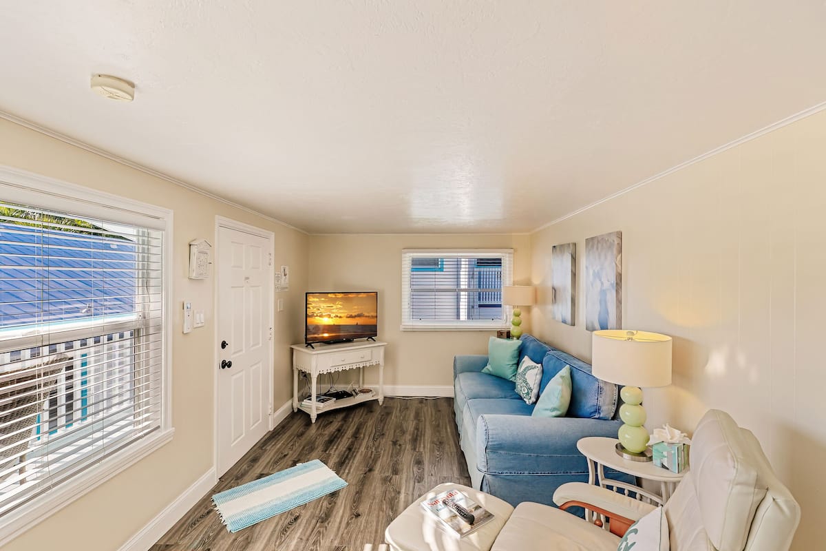 The Lookout, 1 King Bedroom 1 Bath | Living area | 65-inch Smart TV with cable channels, TV, DVD player