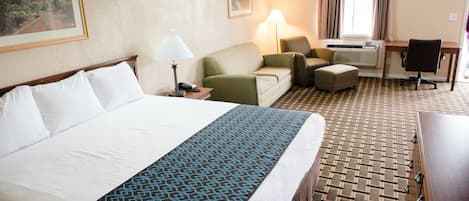 Deluxe Suite, 1 King Bed, Refrigerator & Microwave | Desk, blackout drapes, free WiFi, bed sheets