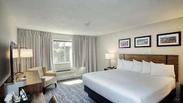 Habitación, 1 cama King size (East, Sorry No Pets) | Caja de seguridad en la habitación y ropa de cama