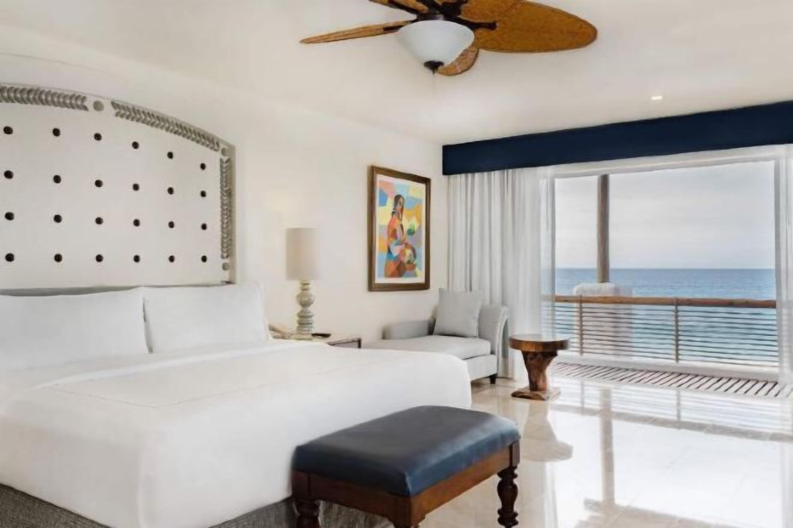 Premium bedding, pillow-top beds, free minibar, in-room safe