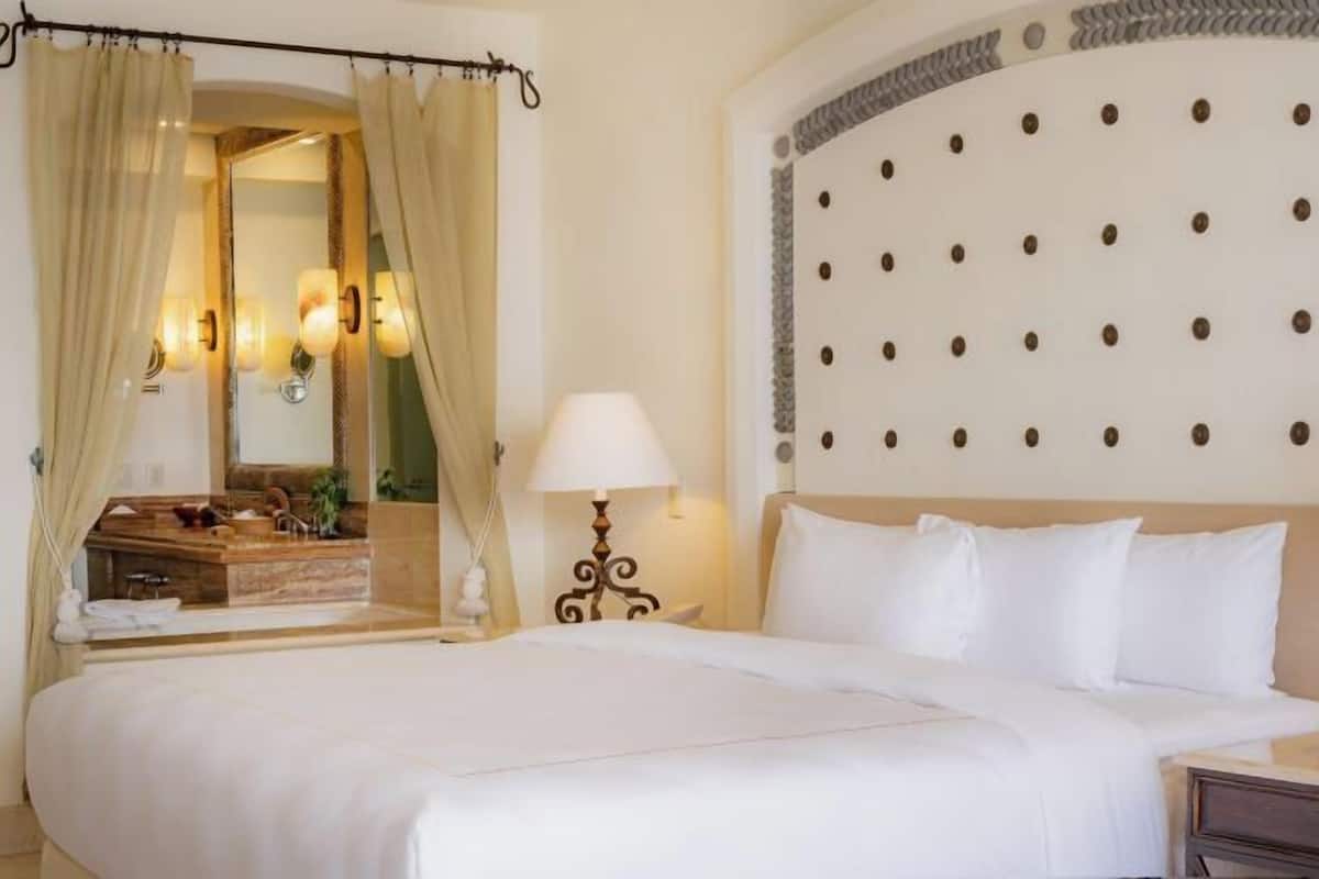 Premium bedding, pillow-top beds, free minibar, in-room safe