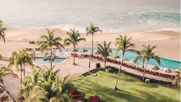 On the beach, sun loungers, beach umbrellas, beach towels