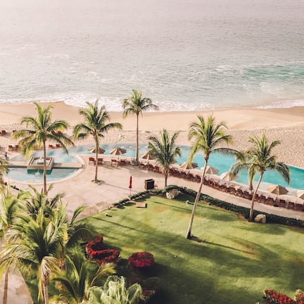 On the beach, sun loungers, beach umbrellas, beach towels