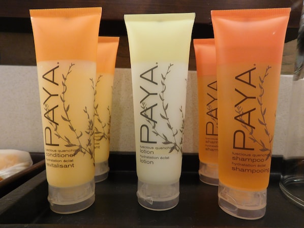 Three tubes of PAYA hair care products on a shelf.