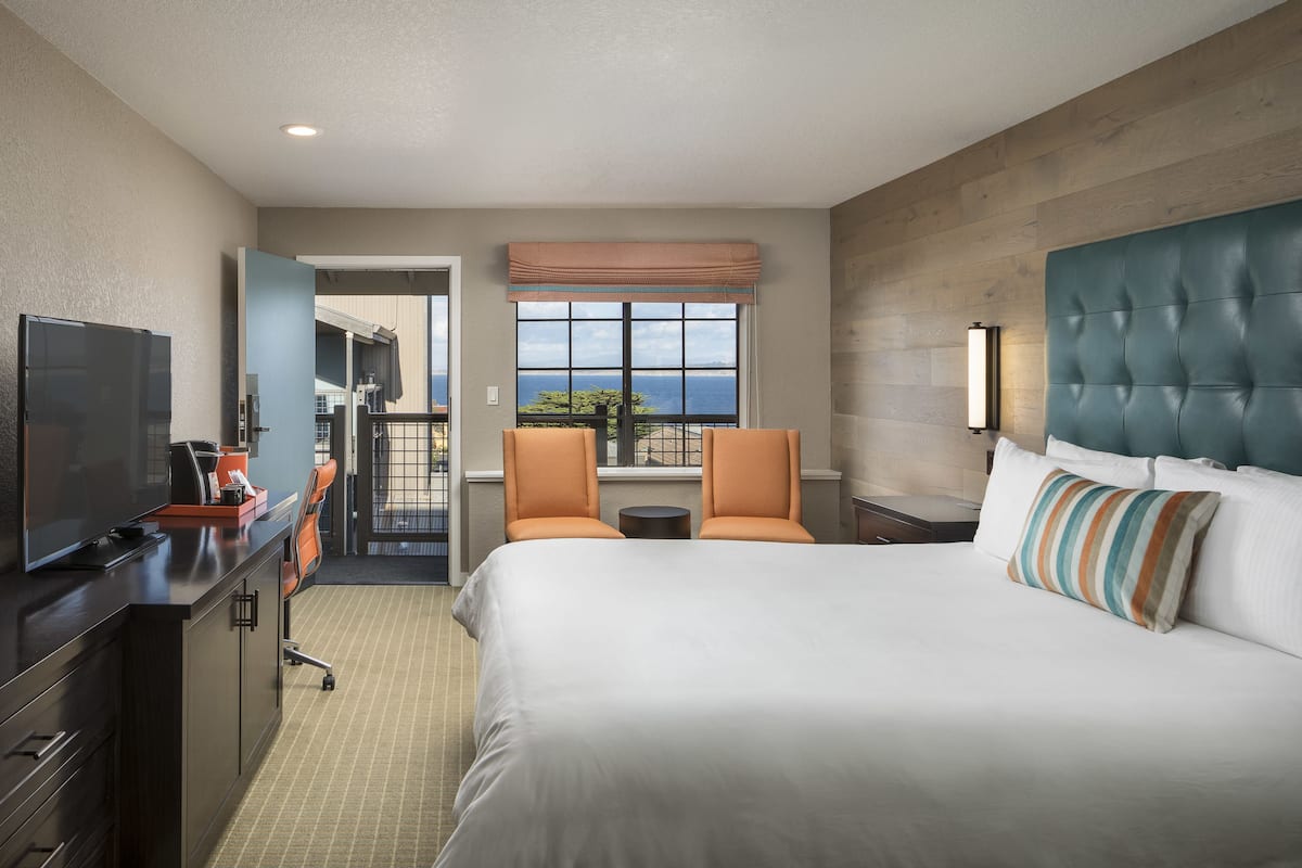 room, 1 king bed (cannery row) | in-room safe, desk, blackout curtains, free cots/infant beds