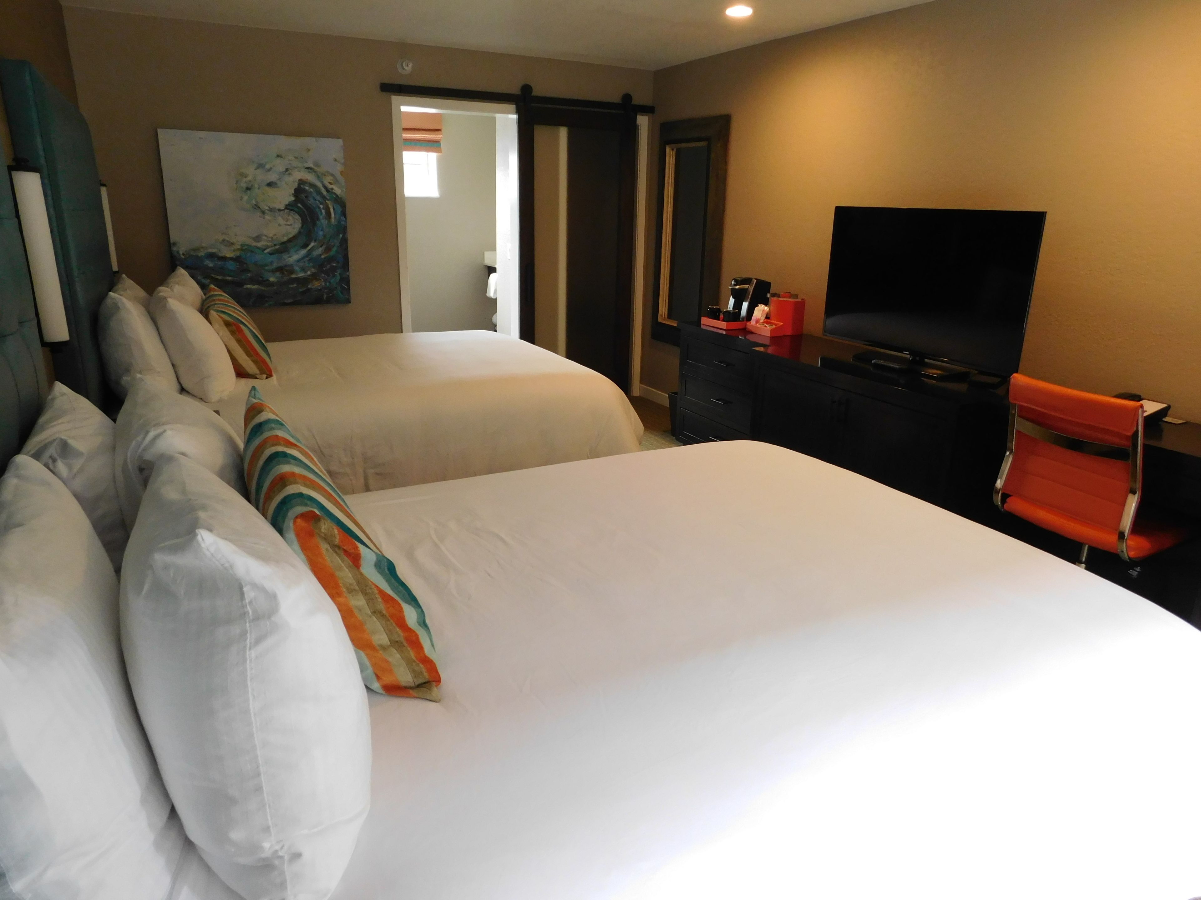room, 2 queen beds (cannery row) | in-room safe, desk, blackout curtains, free cots/infant beds