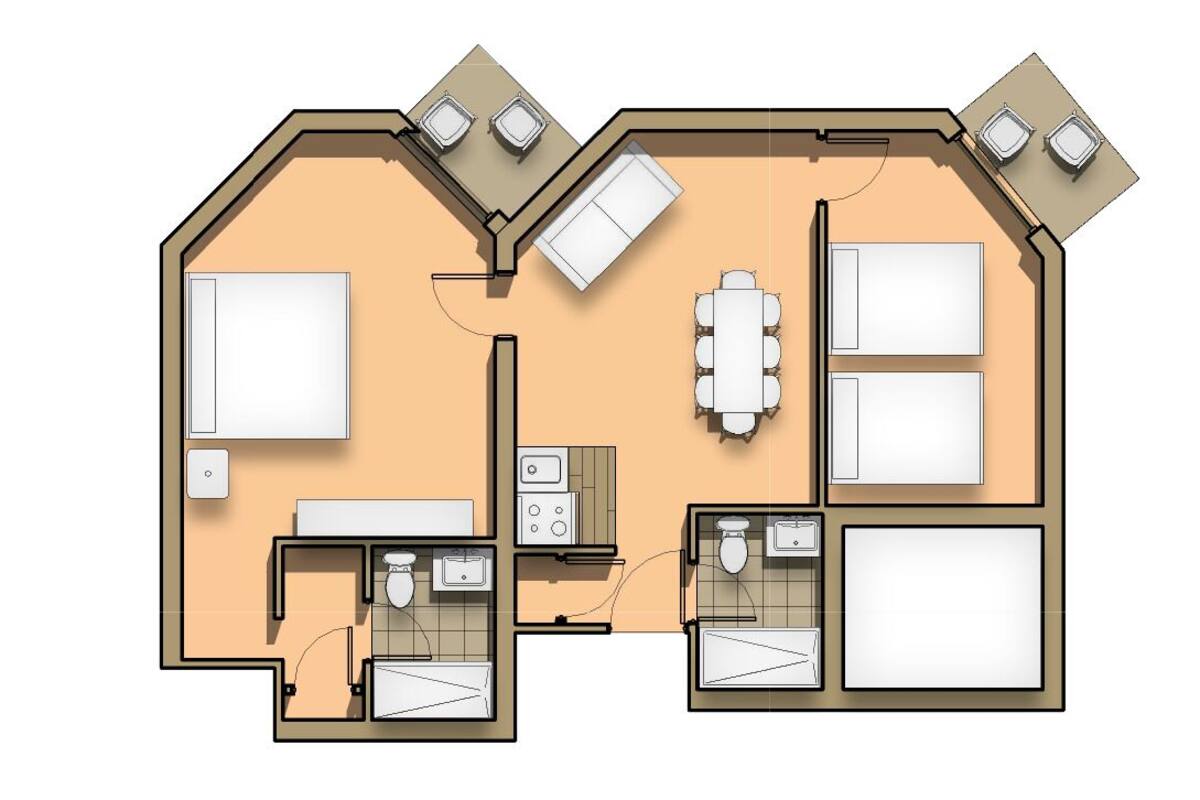 Un plan d’étage d’une chambre d’hôtel comprenant une salle de bain, un coin repas et une kitchenette.