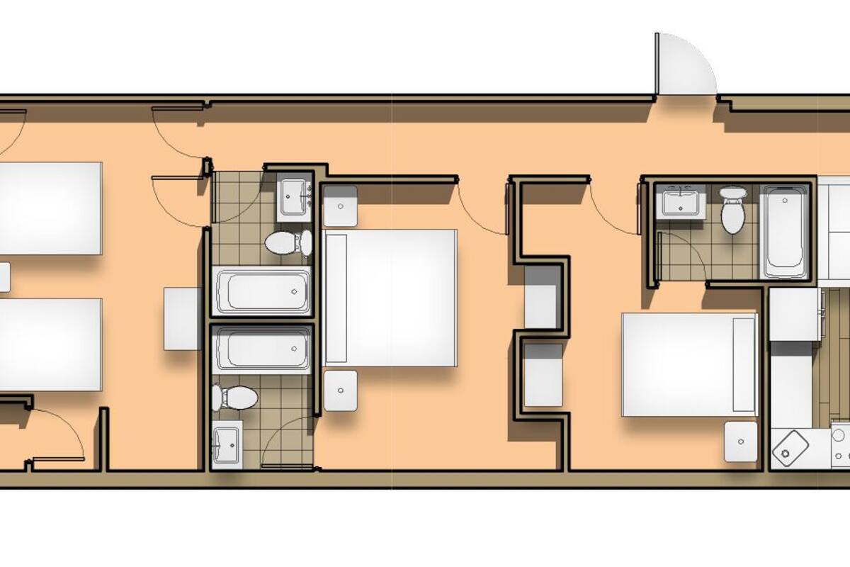 Un plan d’étage d’une chambre d’hôtel comprenant une kitchenette, une salle de bain, un coin repas et un petit espace extérieur aménagé pour s’asseoir.